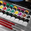 Black packaging box with colored paint tubes for children's art painting set, watercolor oil pastels Application Scenario